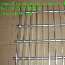 Swaged or dovetail pressure locked grating